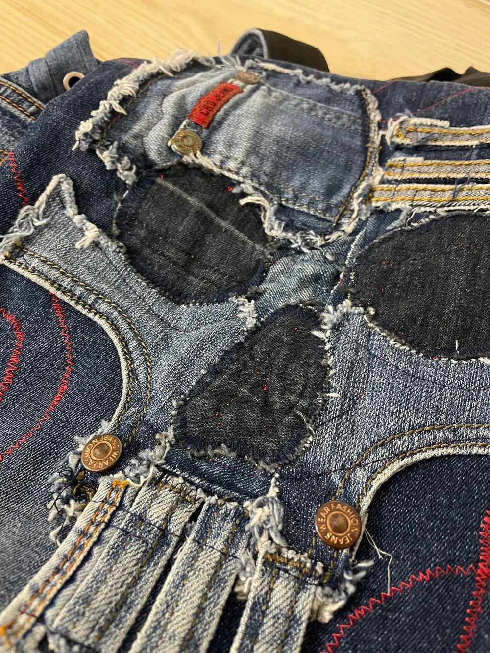 denim skull patchwork backpack