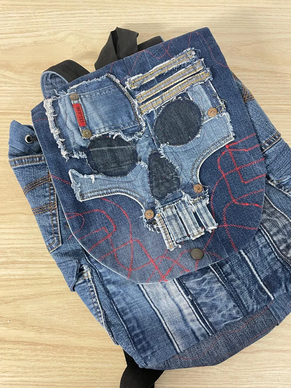 denim skull patchwork backpack