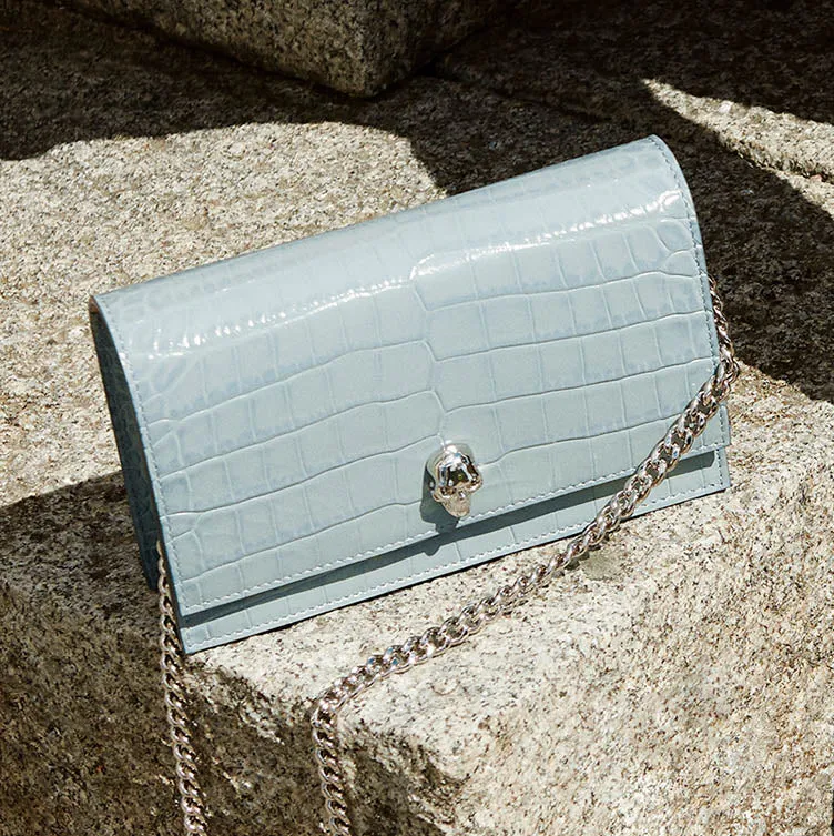Skull mini blue embossed bag